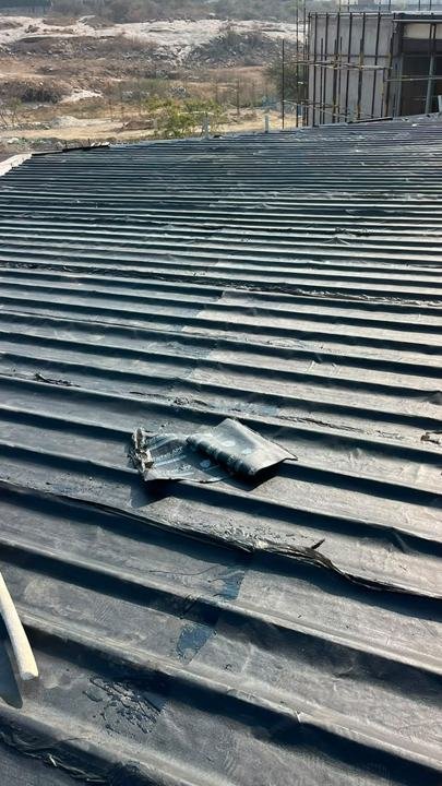 Close view of membrane on ribbed roof sheets
